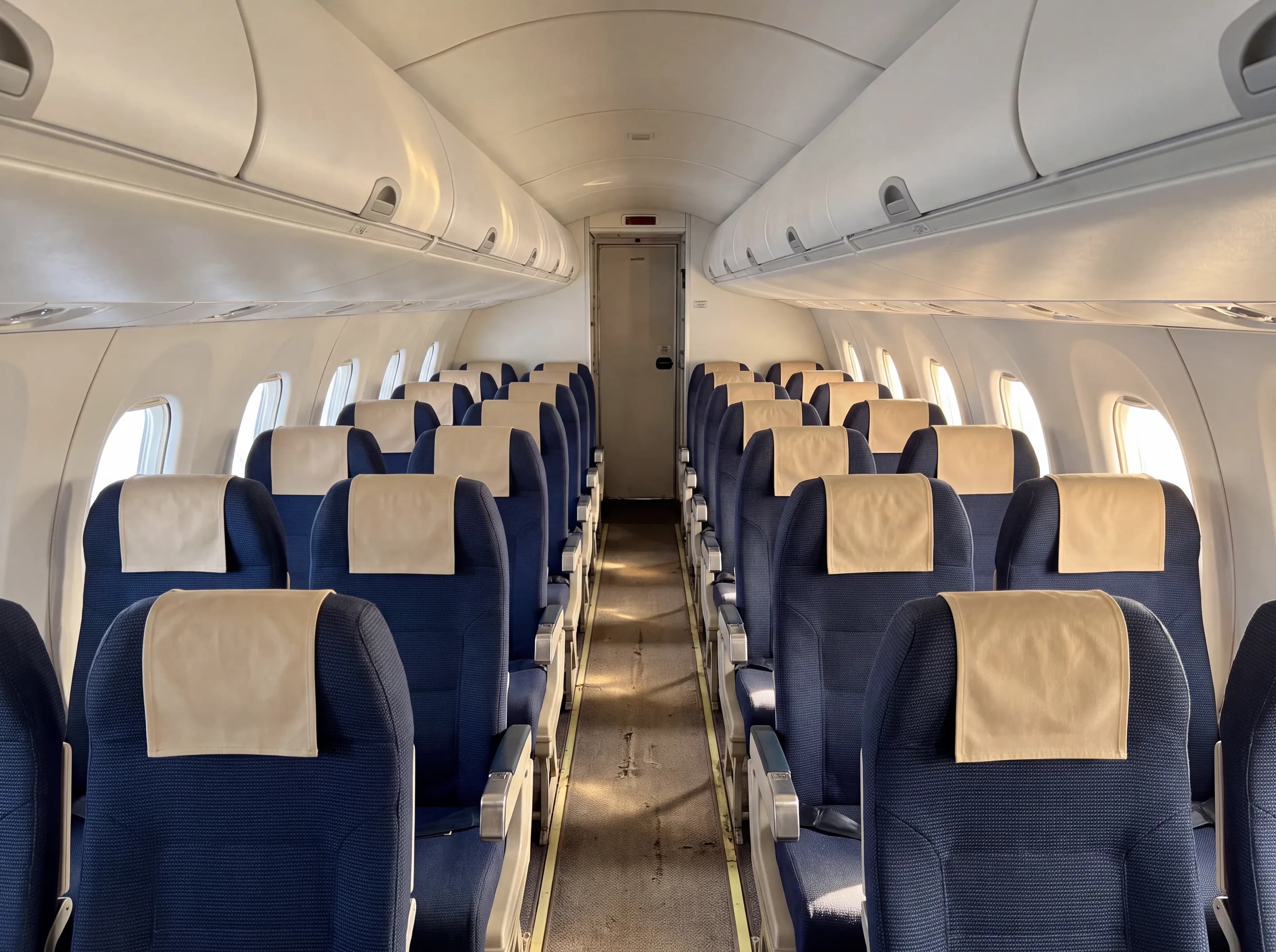 Dash 8 cabin, four abreast (AI-generated illustration)