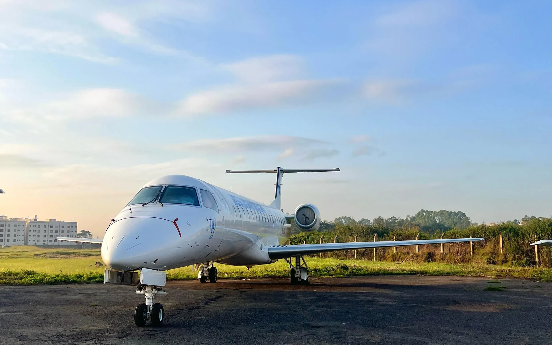 An ALS Embraer ERJ-145 on the apron, seen from the front